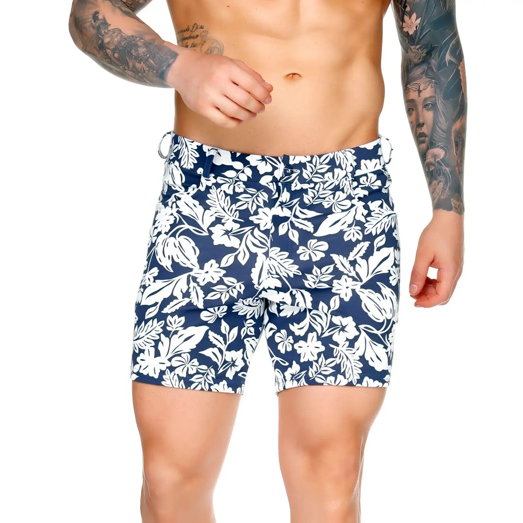 Navy blue Gigo Dynasty Blue short swim trunks with bold white tropical floral pattern for beachwear