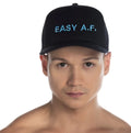 Black snapback cap with embroidered easy a.f. in light blue thread from gigo easy a.f. black caps collection