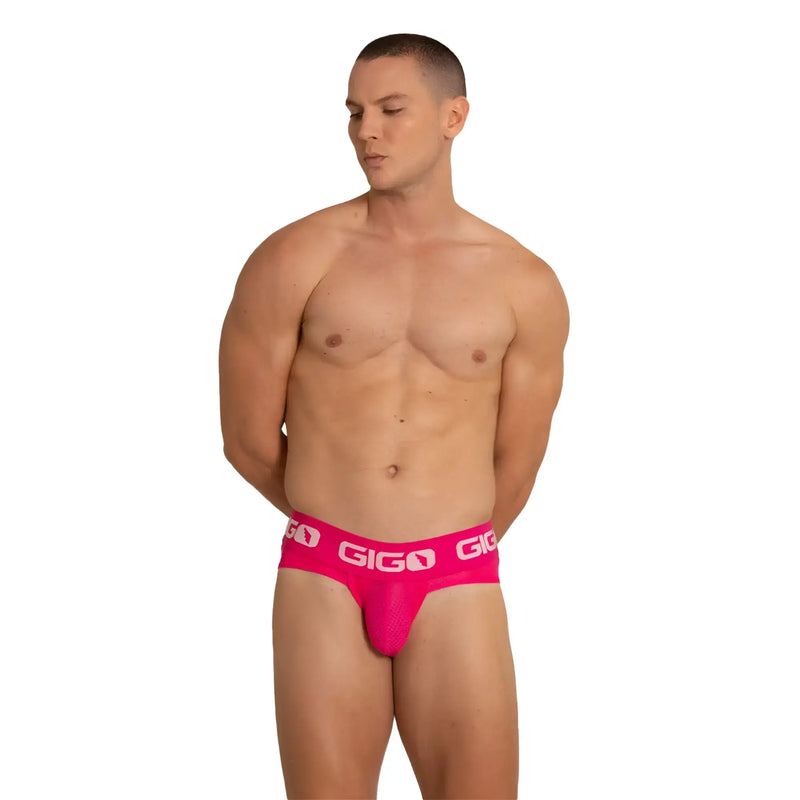 Vibrant pink gigo energetic fucshia brief with mesh texture and white logo trim for comfortable wear
