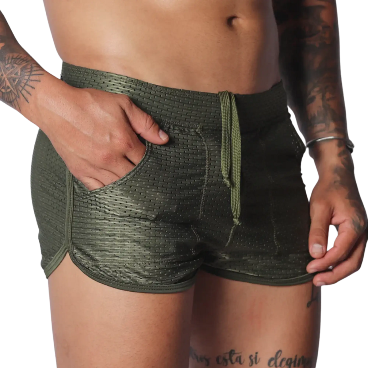 Olive green mesh athletic shorts with a drawstring waist, side pockets, and a short-cut curved hem.