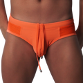 Bright orange low-rise swim brief with perforated side panels and a center drawstring with metal aglets.
