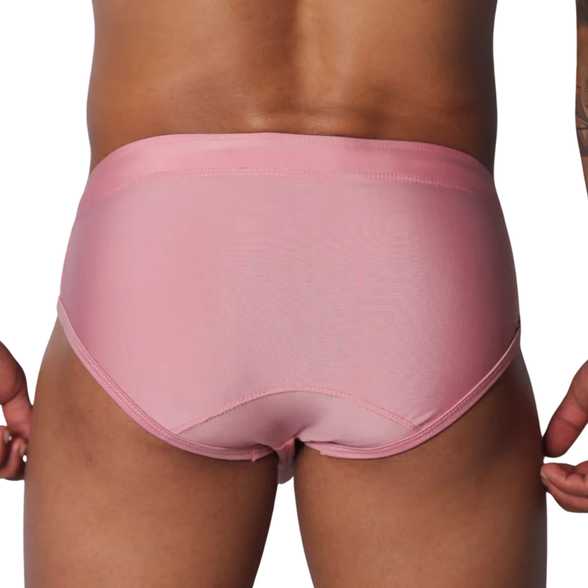 Solid pink athletic swim briefs featuring a classic brief cut with stitched panels and a supportive waistband.