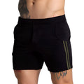 Black textured athletic shorts with olive green side stripes from Gigo F Fetish Green Short collection