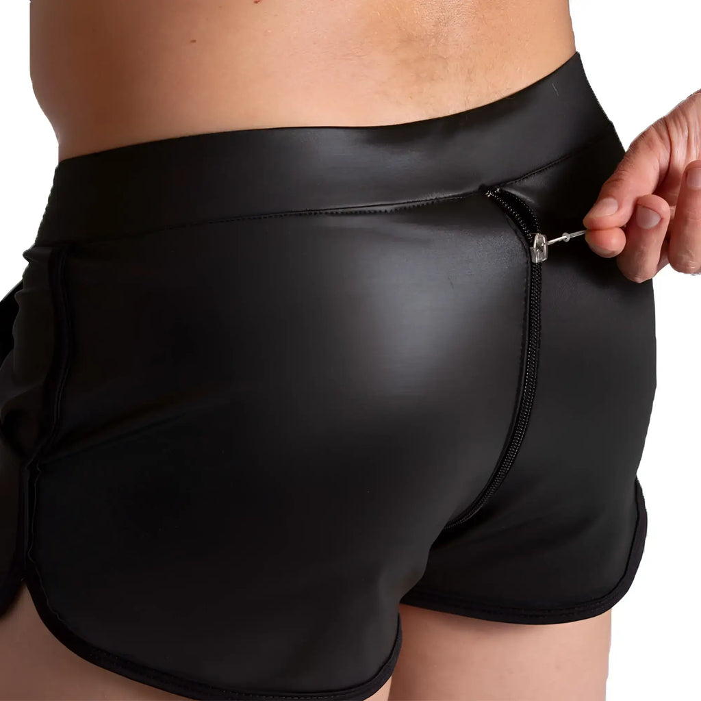 Back view of gigo f fetish short black faux leather shorts with zipper detail on the back