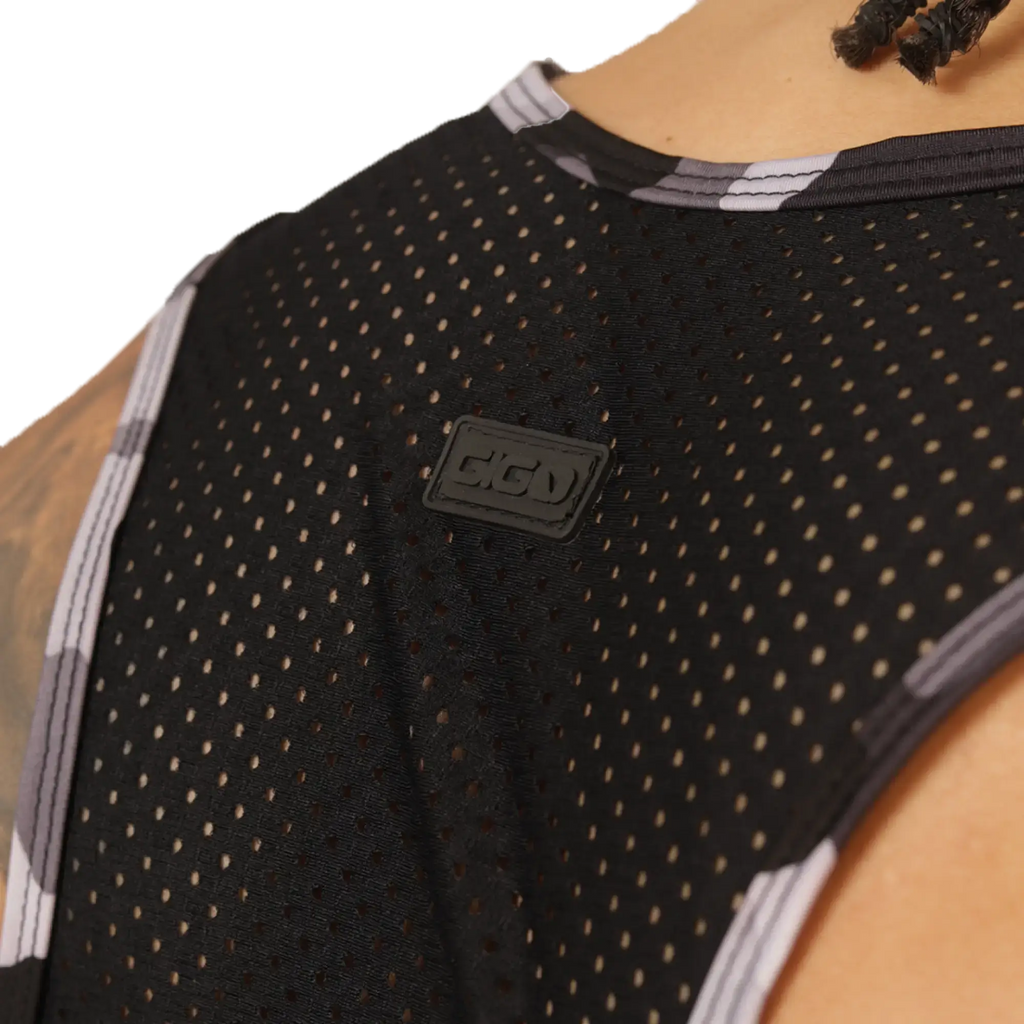 Gigo feeling black tank black mesh basketball jersey with gray and white trim and subtle logo patch on the chest