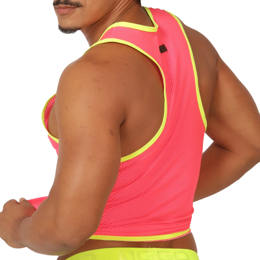 A vibrant neon pink mesh tank top with bold yellow trim and a black logo patch on the shoulder named Gigo Feeling Candy Tank