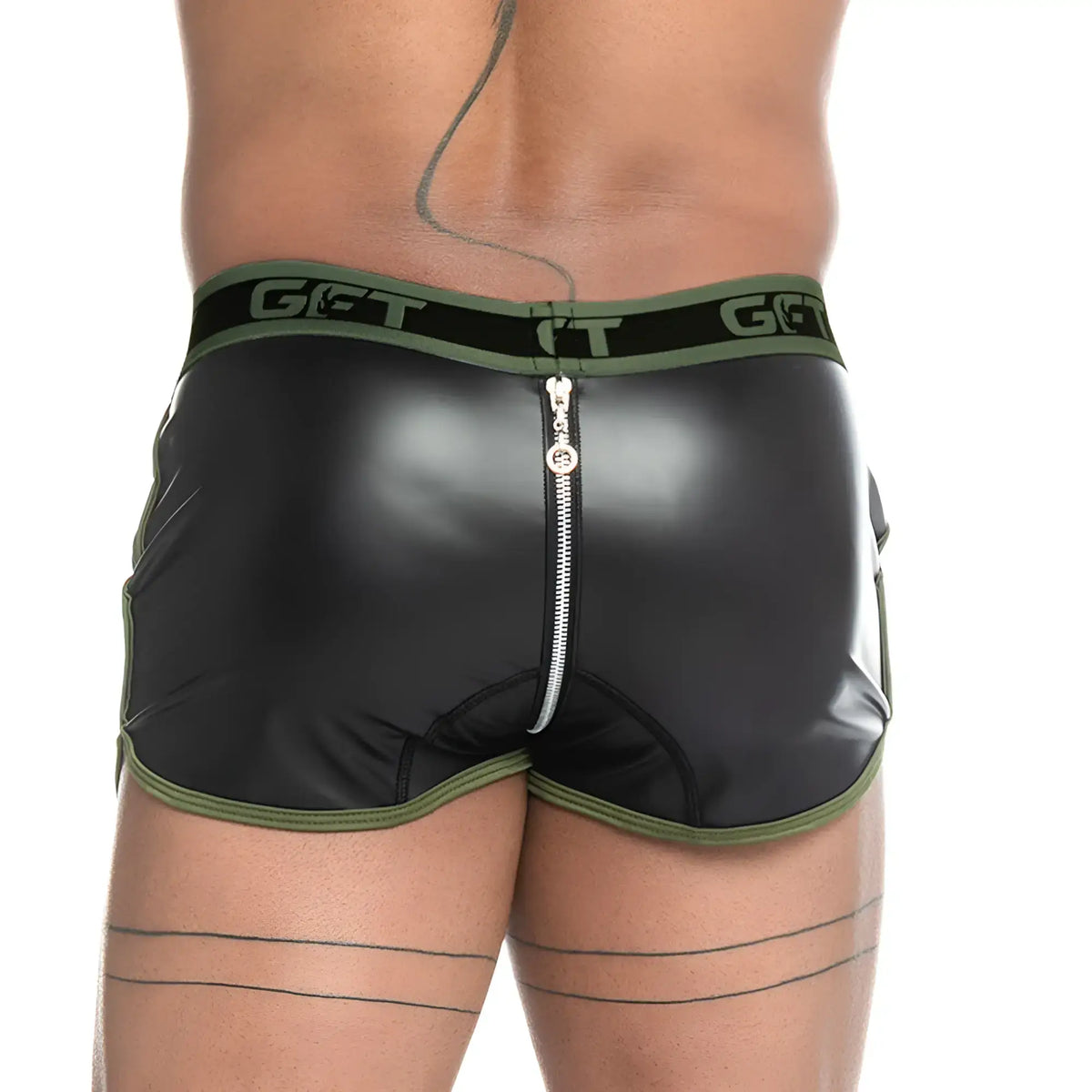 Black patent leather shorts with olive green trim and central zipper featuring get brand logo on waistband