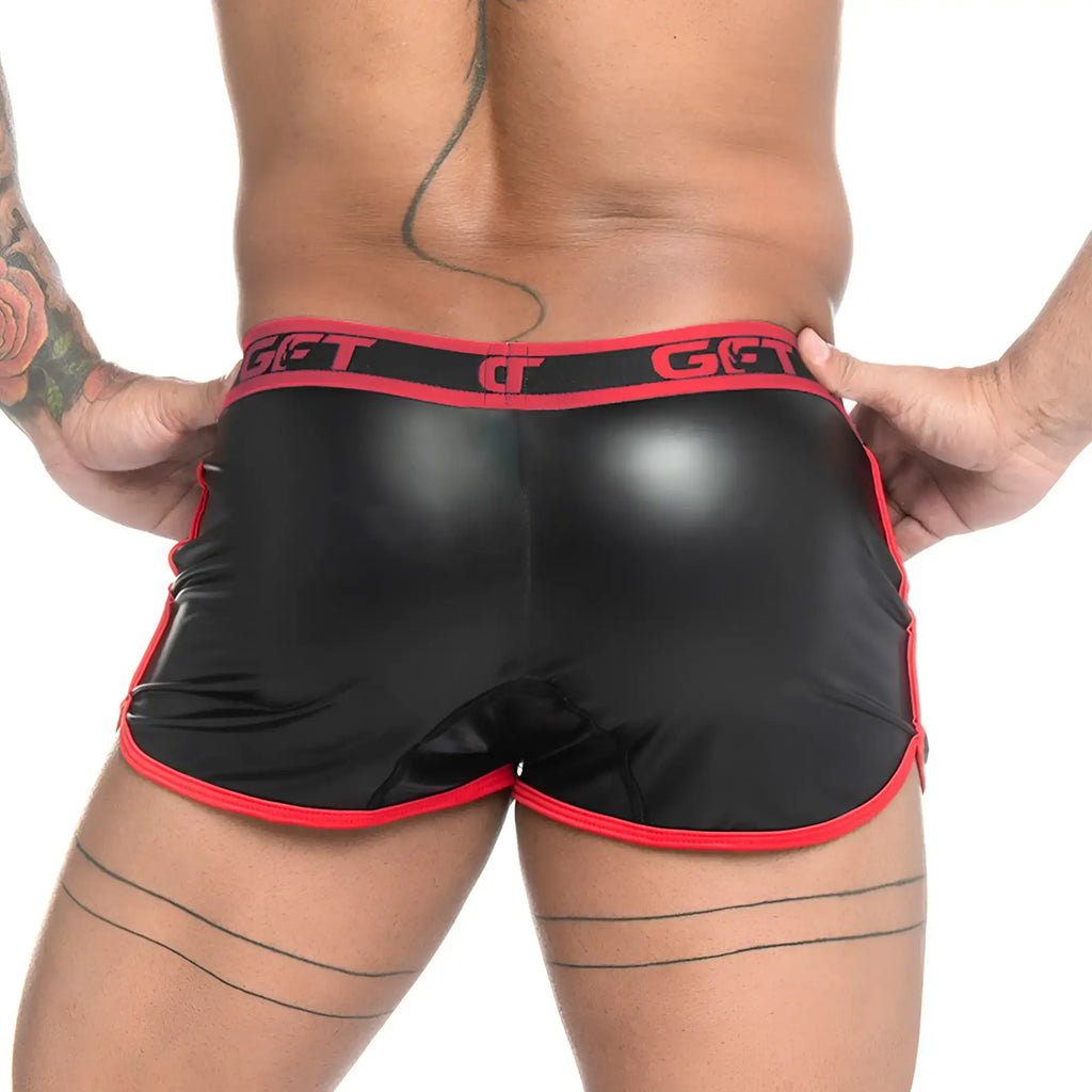 Black glossy gigo fetiche shorts with red trim and matching elastic waistband featuring get logo