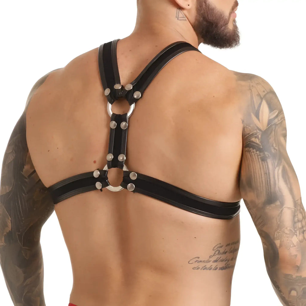 Black leather gigo fetish harness with silver toned metal rings and studs designed for edgy style and secure fit