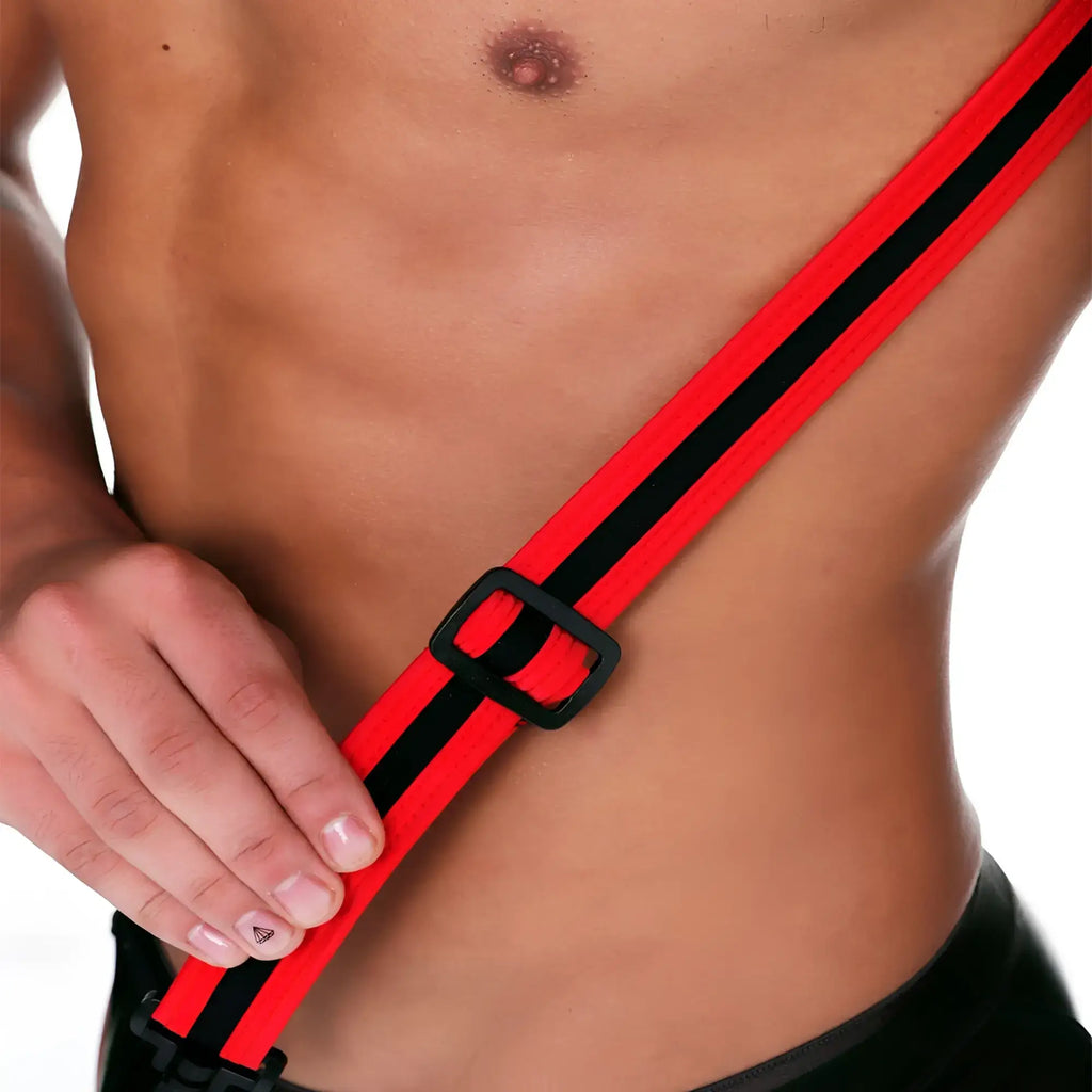 Red and black striped adjustable strap with black plastic buckle for gigo fetish red harness