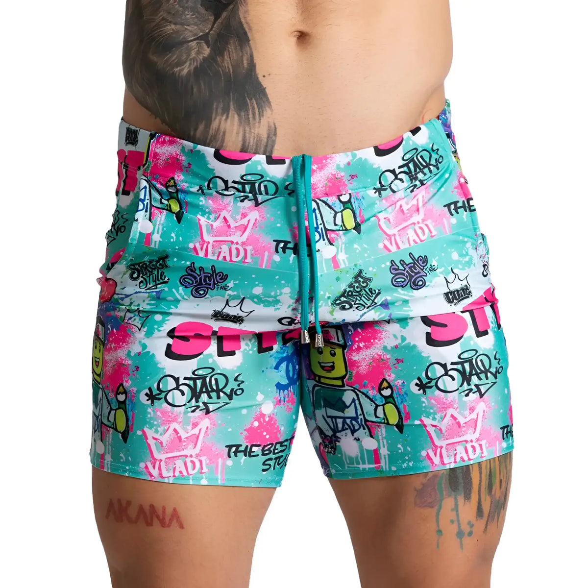 Gigo figure beachwear vibrant turquoise and pink swim trunks with bold graffiti street art patterns for summer wear