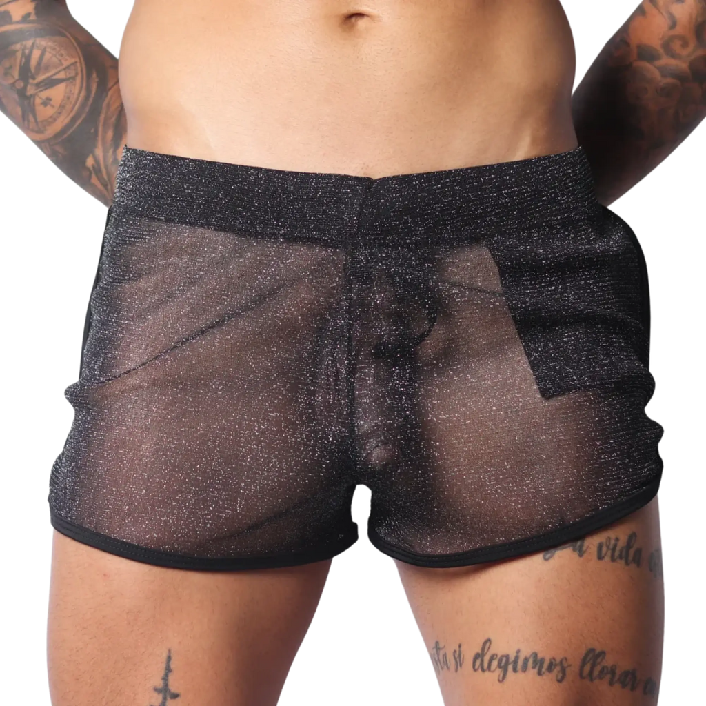 Sheer black metallic glitter shorts with a comfortable elastic waistband and black hem trim.