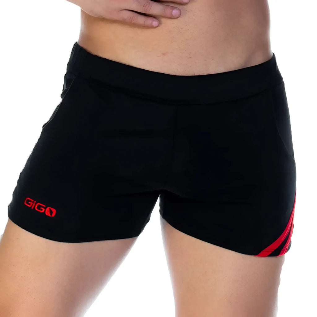 Black athletic shorts with red side stripes and gigo logo on the left leg from the gigo forever black red short line