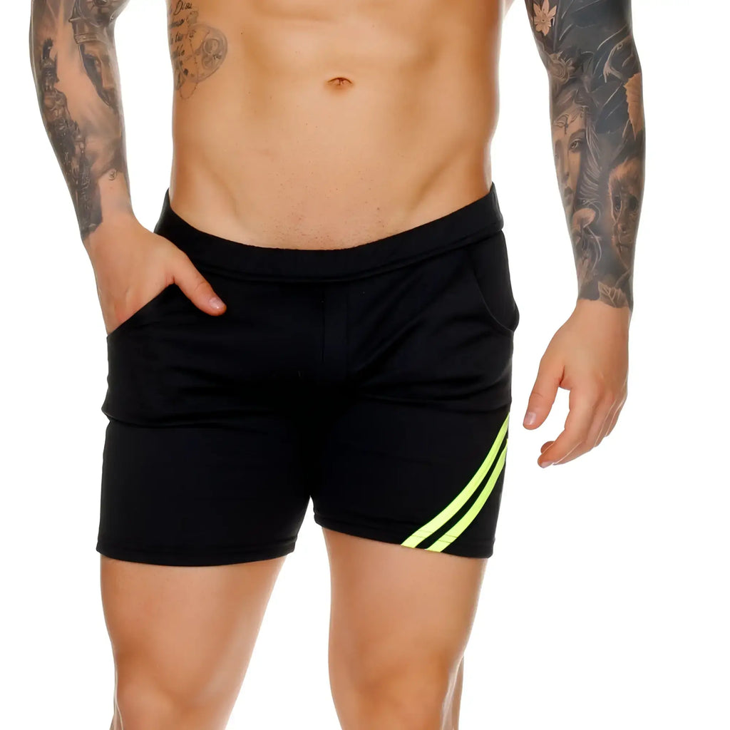 Gigo Forever Long black athletic shorts with neon green diagonal stripes on the side for performance wear