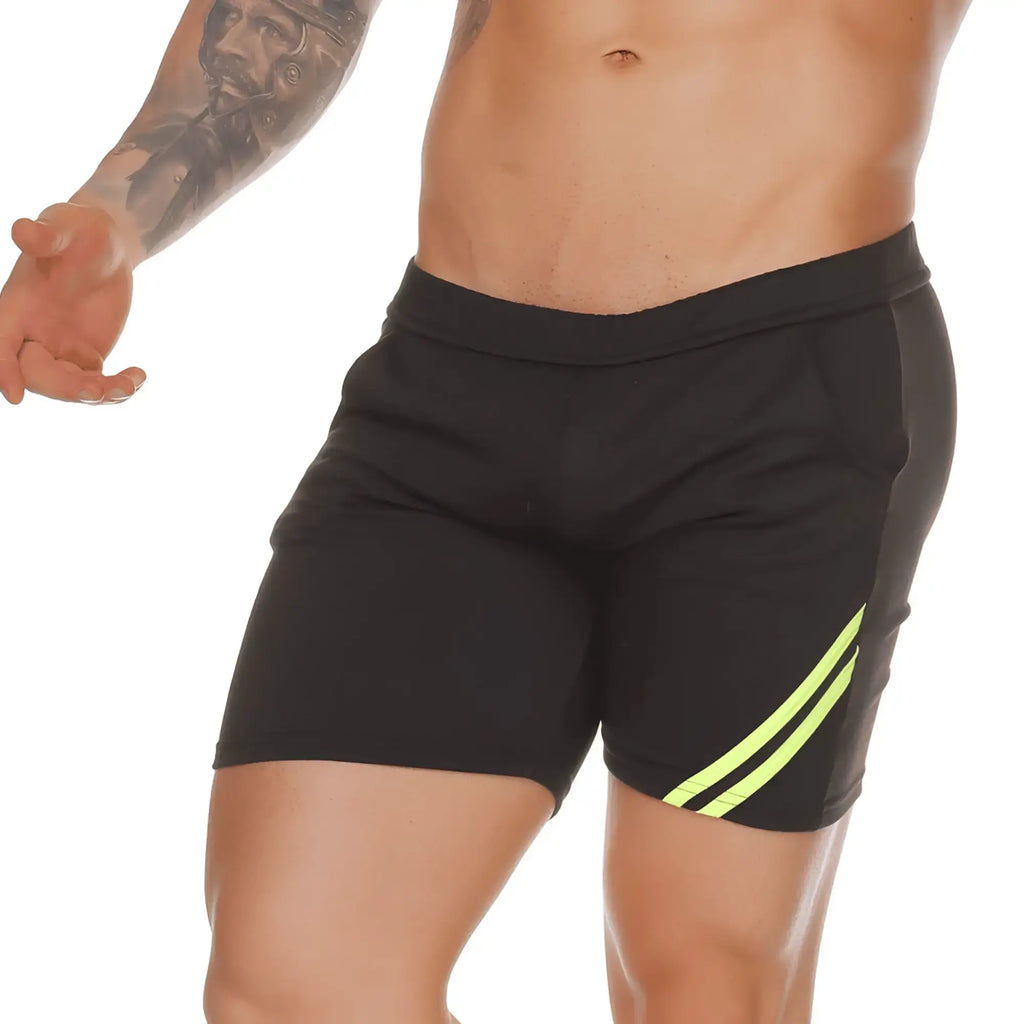 Gigo Forever Long black athletic shorts with neon yellow diagonal stripes on the side for active wear