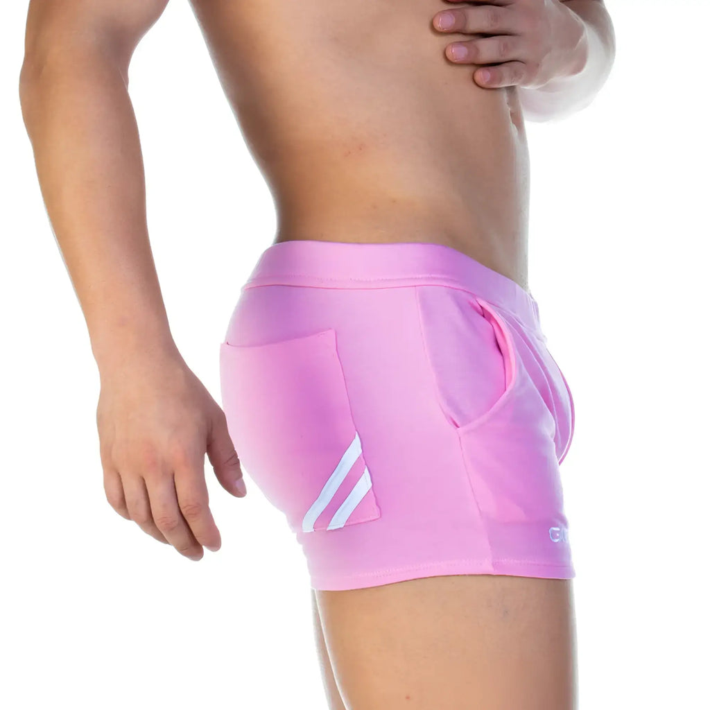 Pink athletic shorts gigo forever pink short with white diagonal stripes on side pocket and small logo near hem
