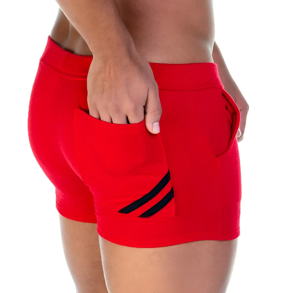 Red athletic shorts with black diagonal stripes on side pockets from gigo forever for sports and casual wear