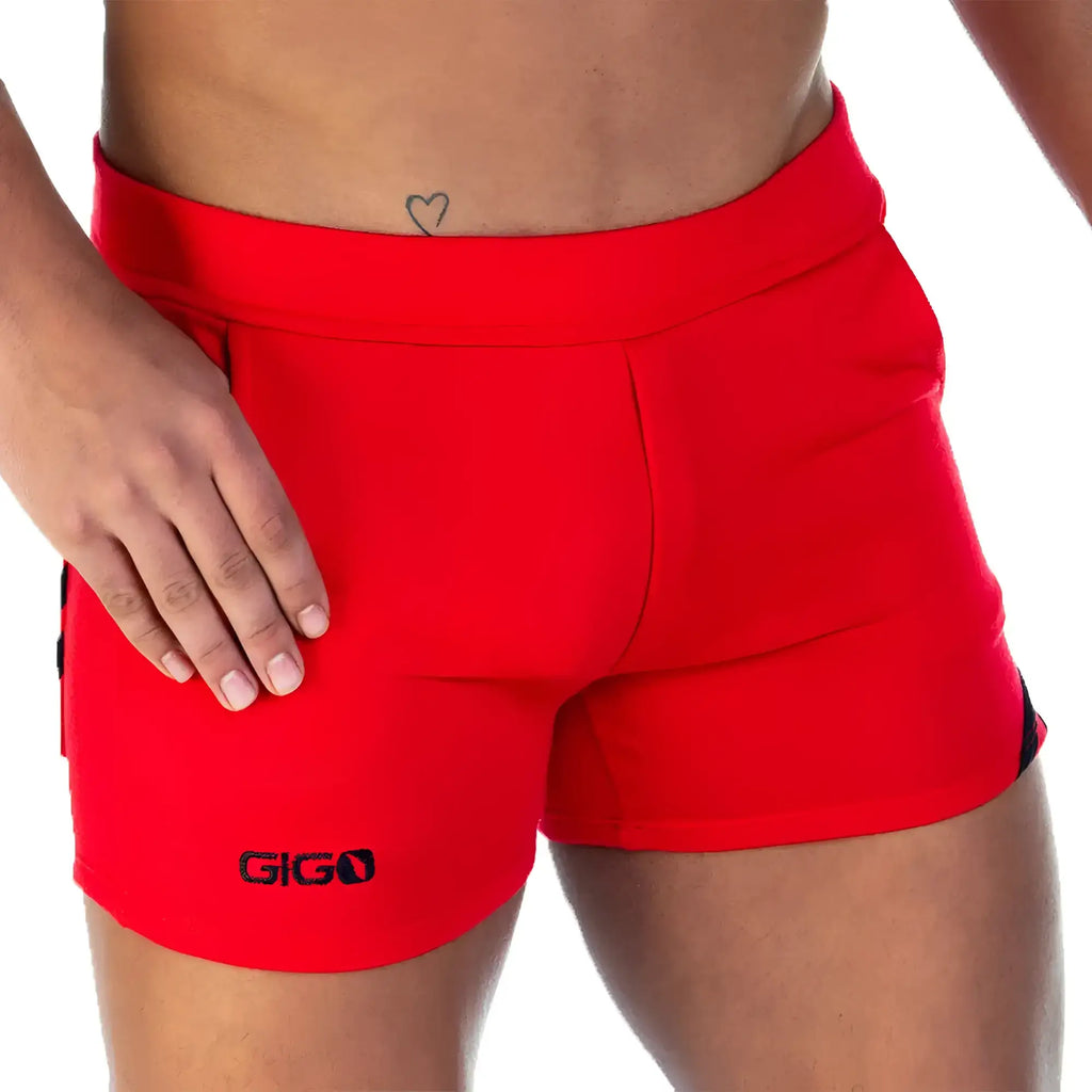 Red gigo athletic shorts with black side accents and a snug form-fitting design for active wear