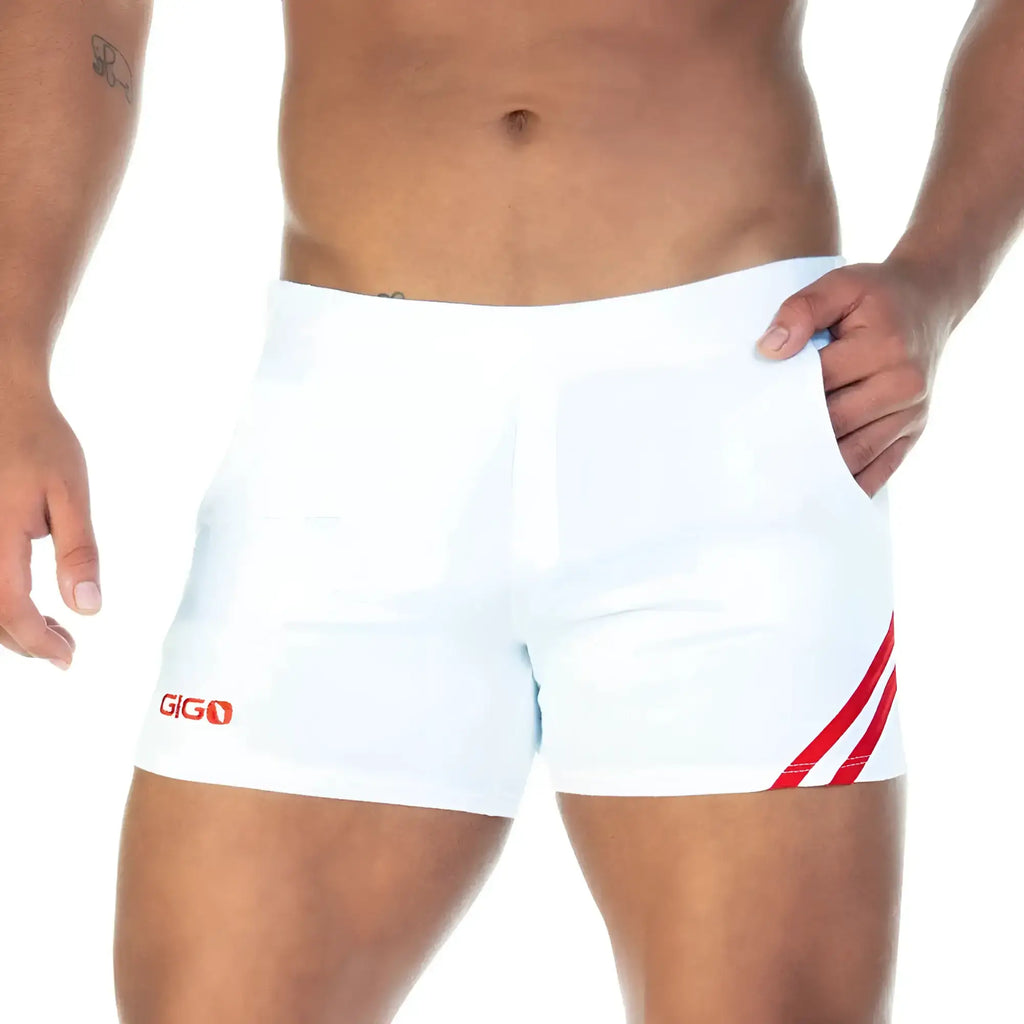 White athletic shorts with red diagonal stripes and gigo logo on the left leg from the Gigo Forever collection