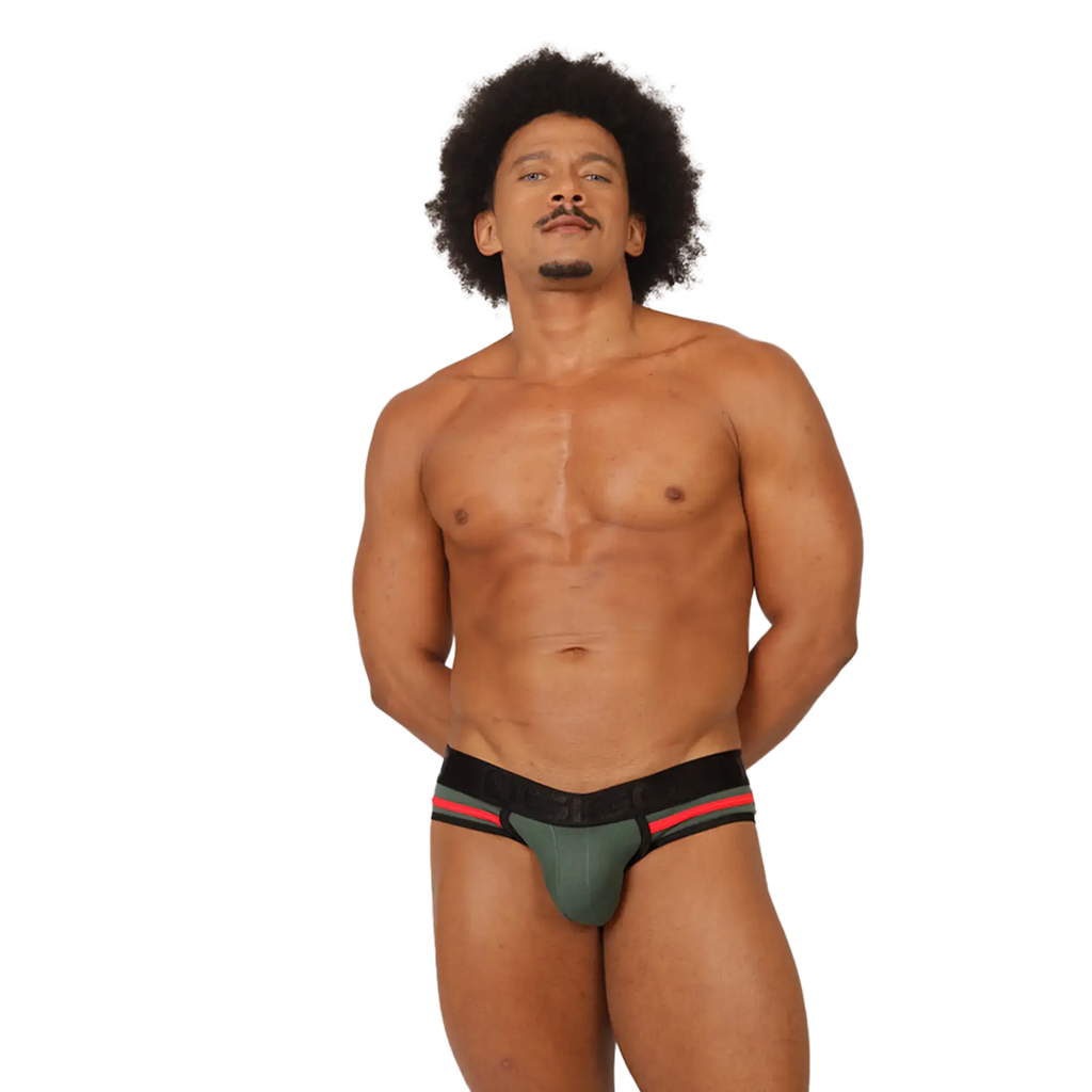 A muscular man with an afro wearing a green black and red gigo garoto athletic brief showing the front side
