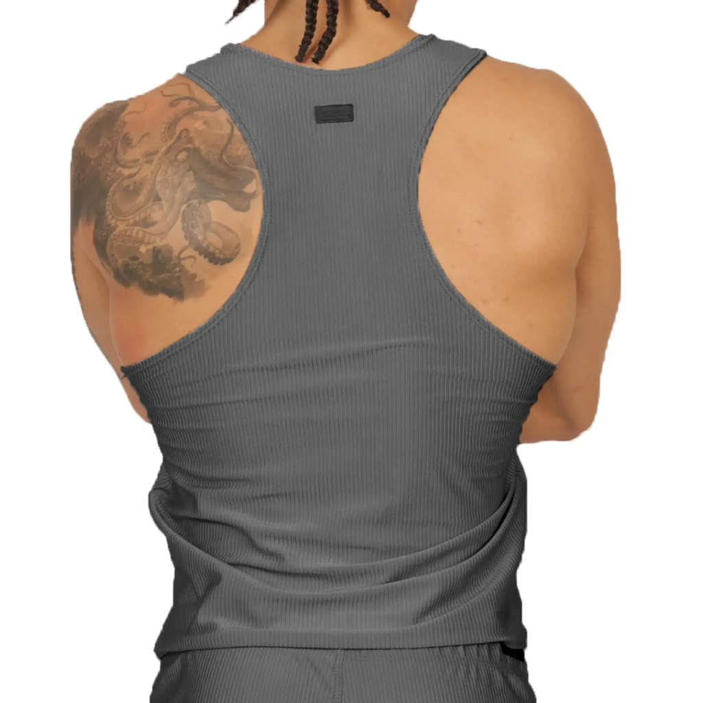 Back view of gigo glow gray tank made of gray ribbed fabric with a small black tag at the neck