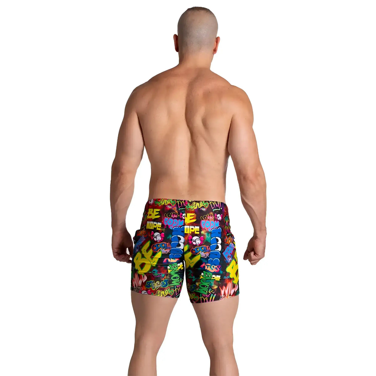 Vibrant graffiti-patterned menÃ¢â‚¬â„¢s swim trunks in bold colours with playful street art design from Gigo Graffiti Beachwear