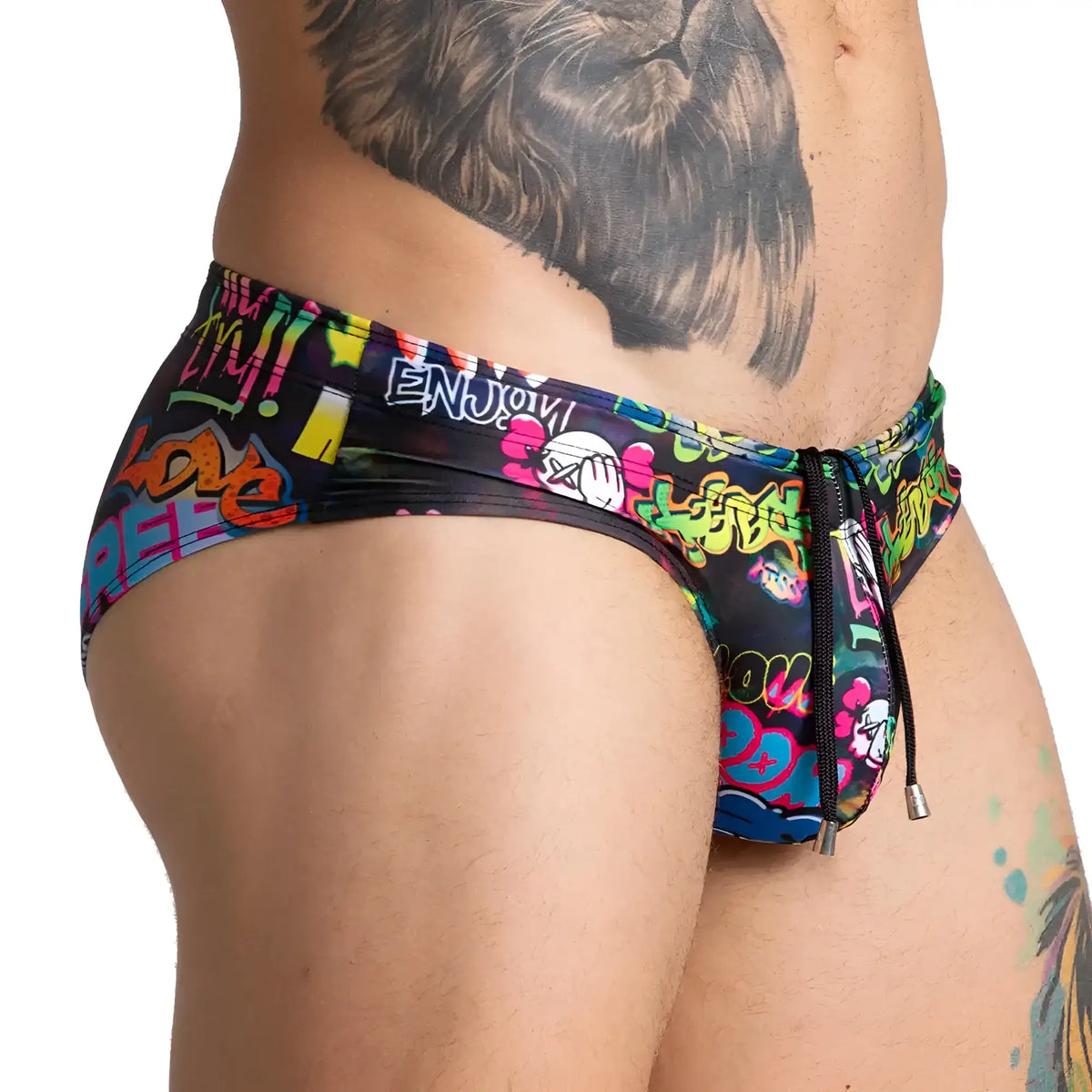 Gigo graffiti swim brief featuring vibrant neon graffiti pattern on black base with drawstring closure for swimming