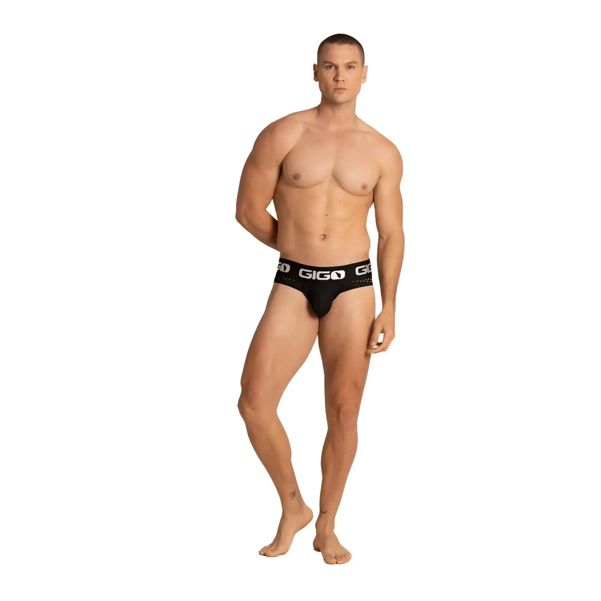 Black gigo brand brief jock with white logo and dotted trim designed for hybrid comfort and style