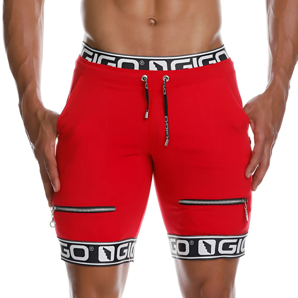Gigo id red short with black and white branded waistband and hem red athletic shorts featuring side zippers