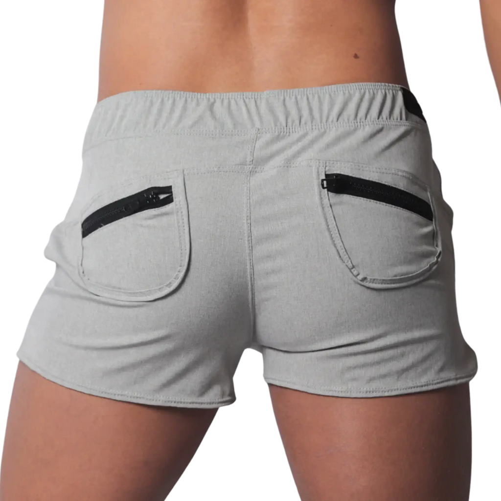 Gray heathered athletic shorts with an elastic waistband and two back pockets featuring contrasting black zippers.