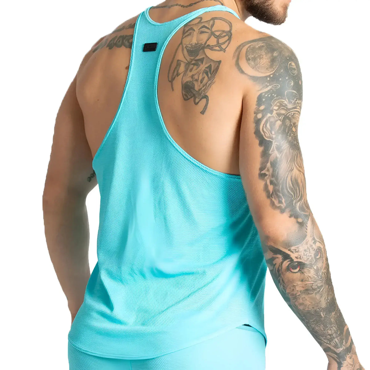 A vibrant turquoise Gigo Lemon Blue Tank athletic tank top with breathable textured fabric and racerback design