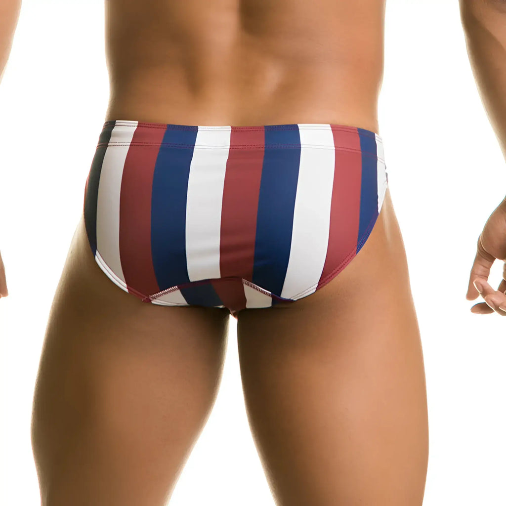 Gigo line swim brief featuring red white and blue vertically striped swim trunks for comfortable swimming use