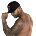 Black baseball cap with red and white embroidered rolling stones logo from gigo lips black caps collection
