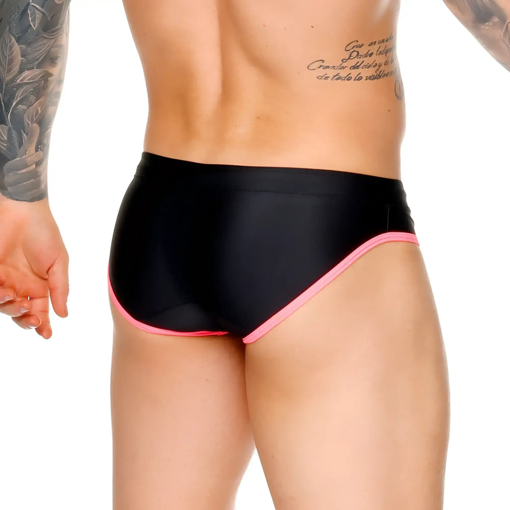 Black gigo medieval candy swim brief with vibrant pink trim along waistband and leg openings for swimwear use