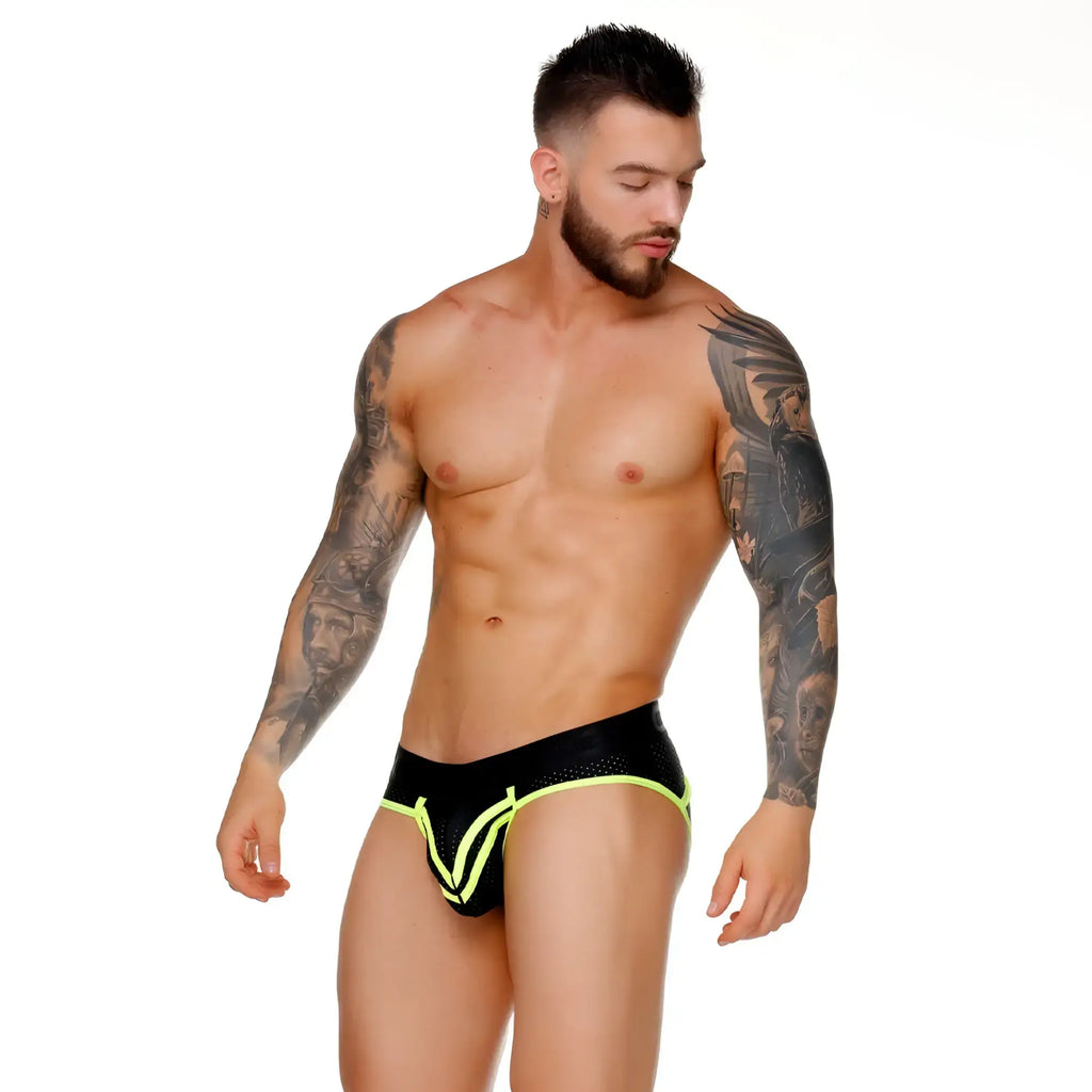 Black gigo medieval yellow brief jockstrap with neon yellow trim and mesh panel designed for athletic use