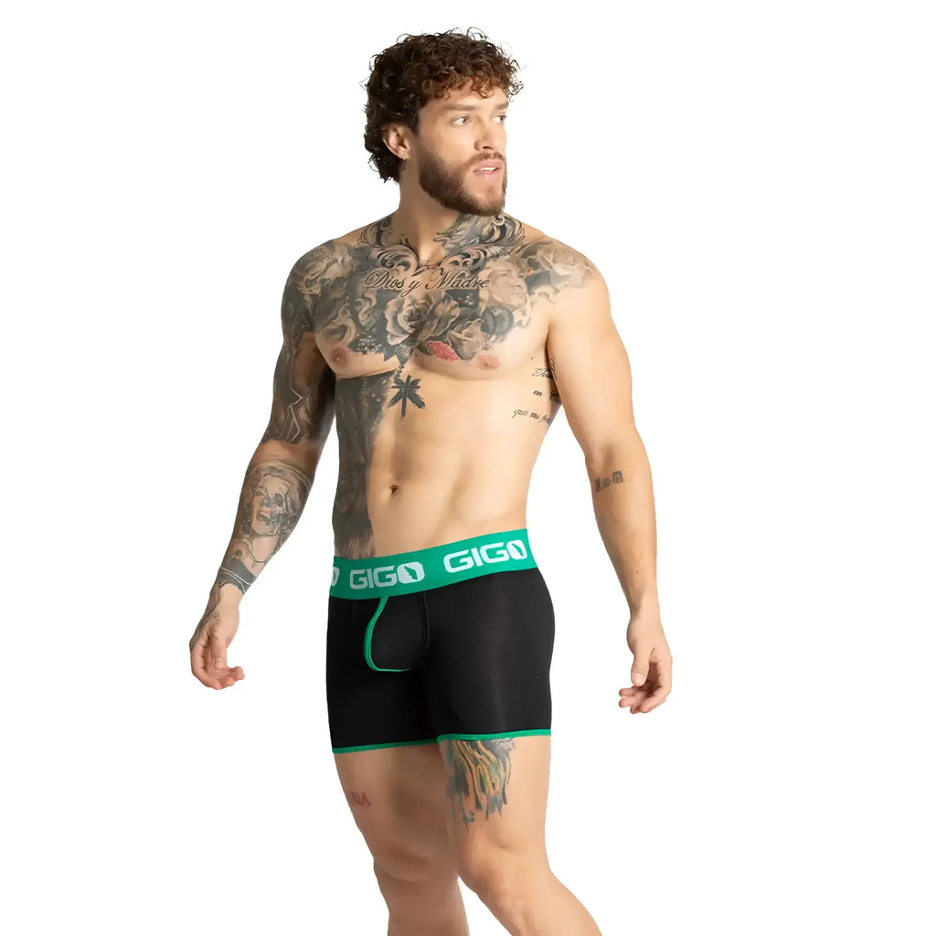 Black giga boxer briefs with vibrant green trim and branding in the style of gigo misty green trunk