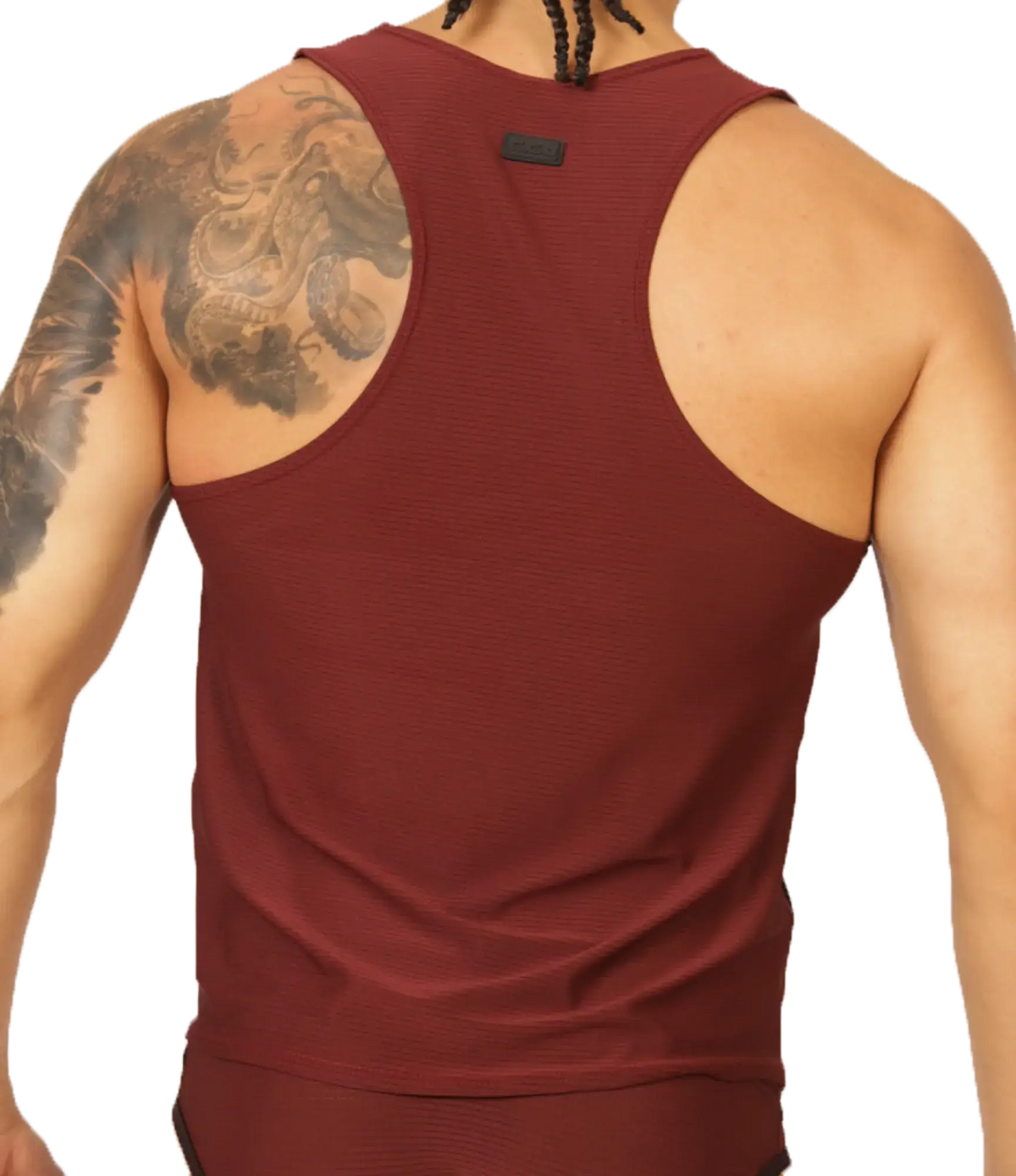 Maroon ribbed tank top with black brand tag at neckline in gigo mix wine tank style made from soft fabric