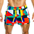 Gigo multicolour beachwear vibrant geometric patterned swim trunks in red teal yellow and navy blue for summer use