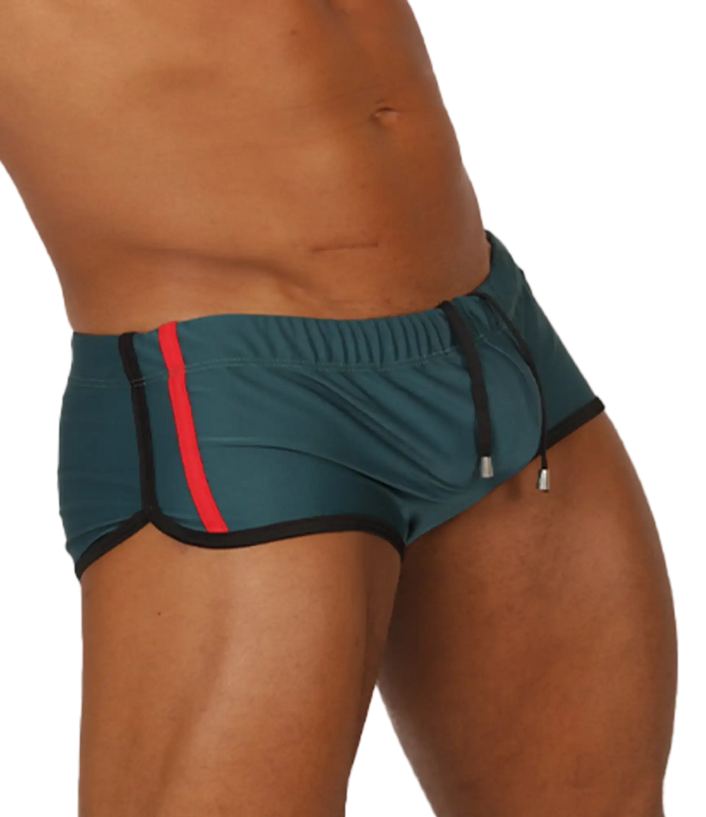 Gigo Nice Green swim trunk in teal with a bold red stripe and black trim designed for athletic use