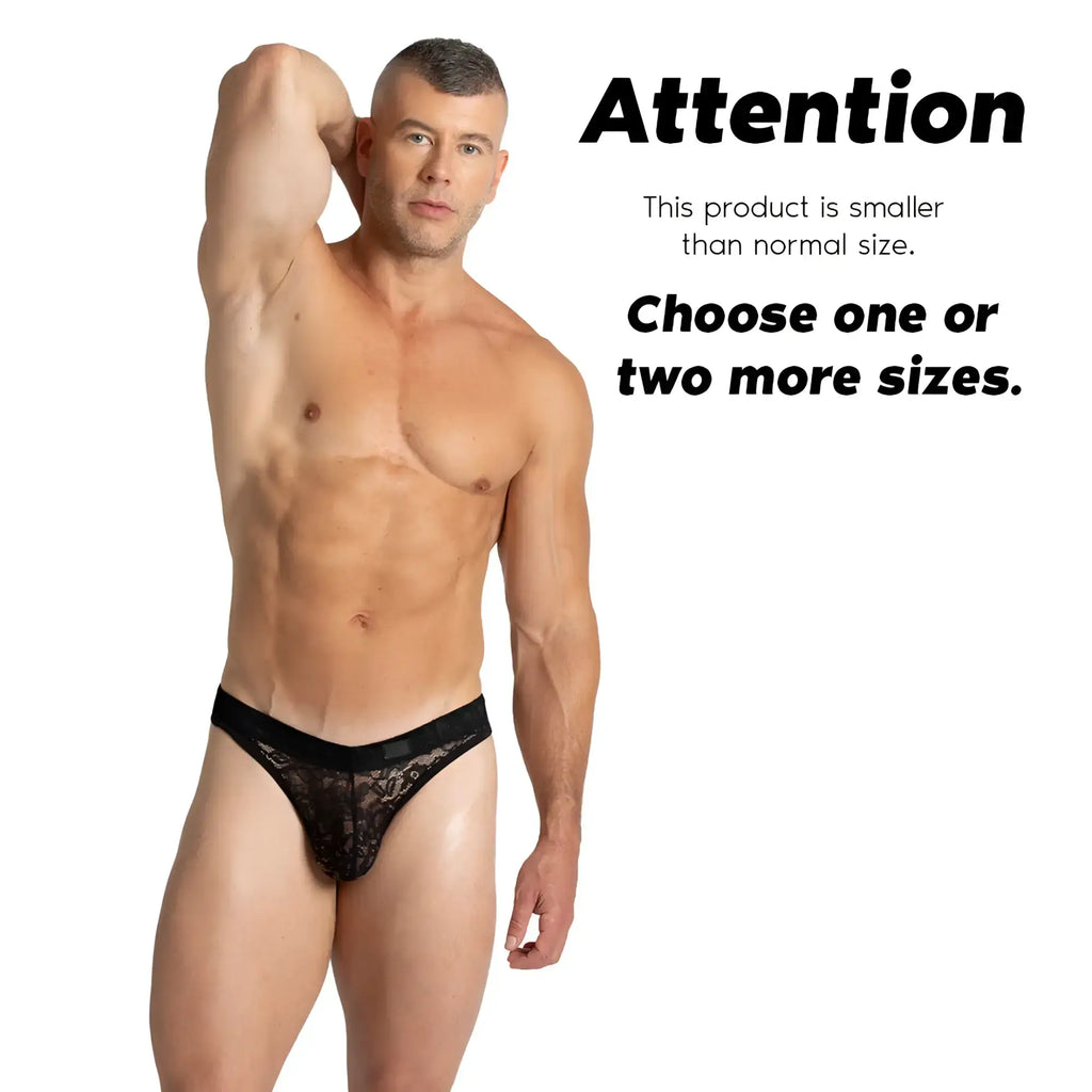 Black lace thong with solid black waistband shown from the back in the gigo paradise black gstring collection