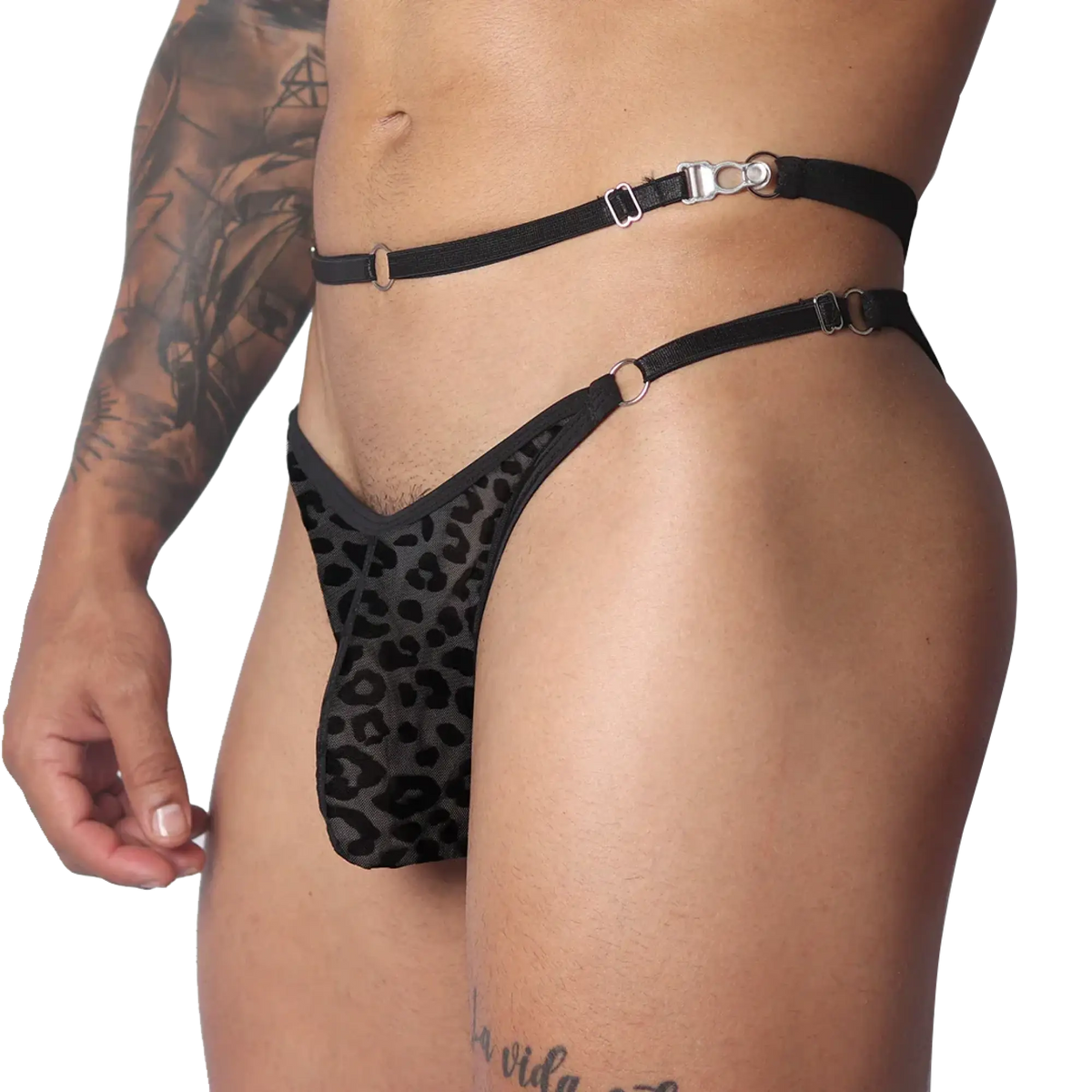 Black leopard-print plush jockstrap featuring thin elastic waist straps, metal rings, and adjustable metal hardware.