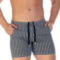 Black and white vertically striped swim trunks with drawstring waistband from gigo polo black beachwear collection