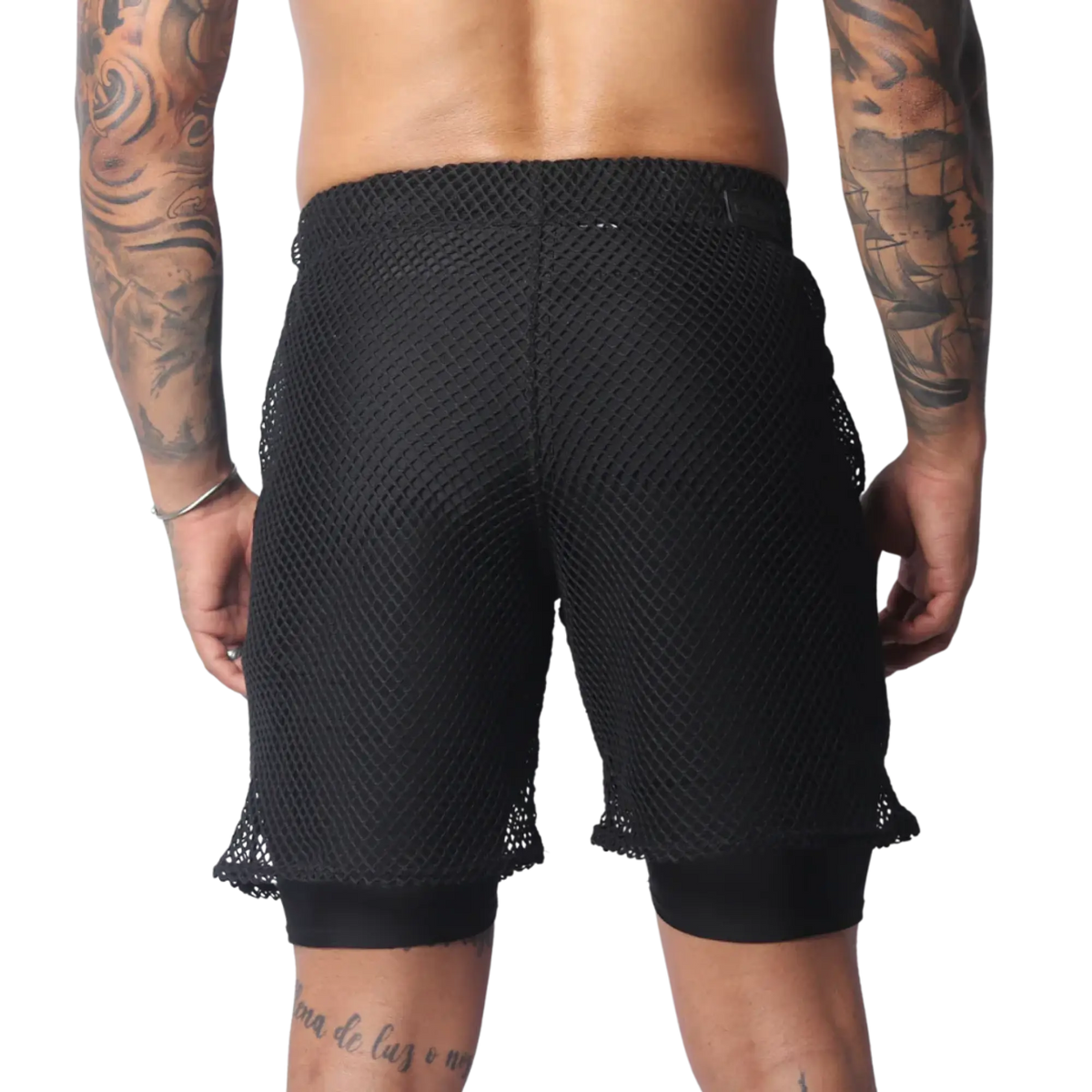 Black athletic shorts featuring a layered design with a loose, wide-gauge mesh outer layer over solid fitted liners.