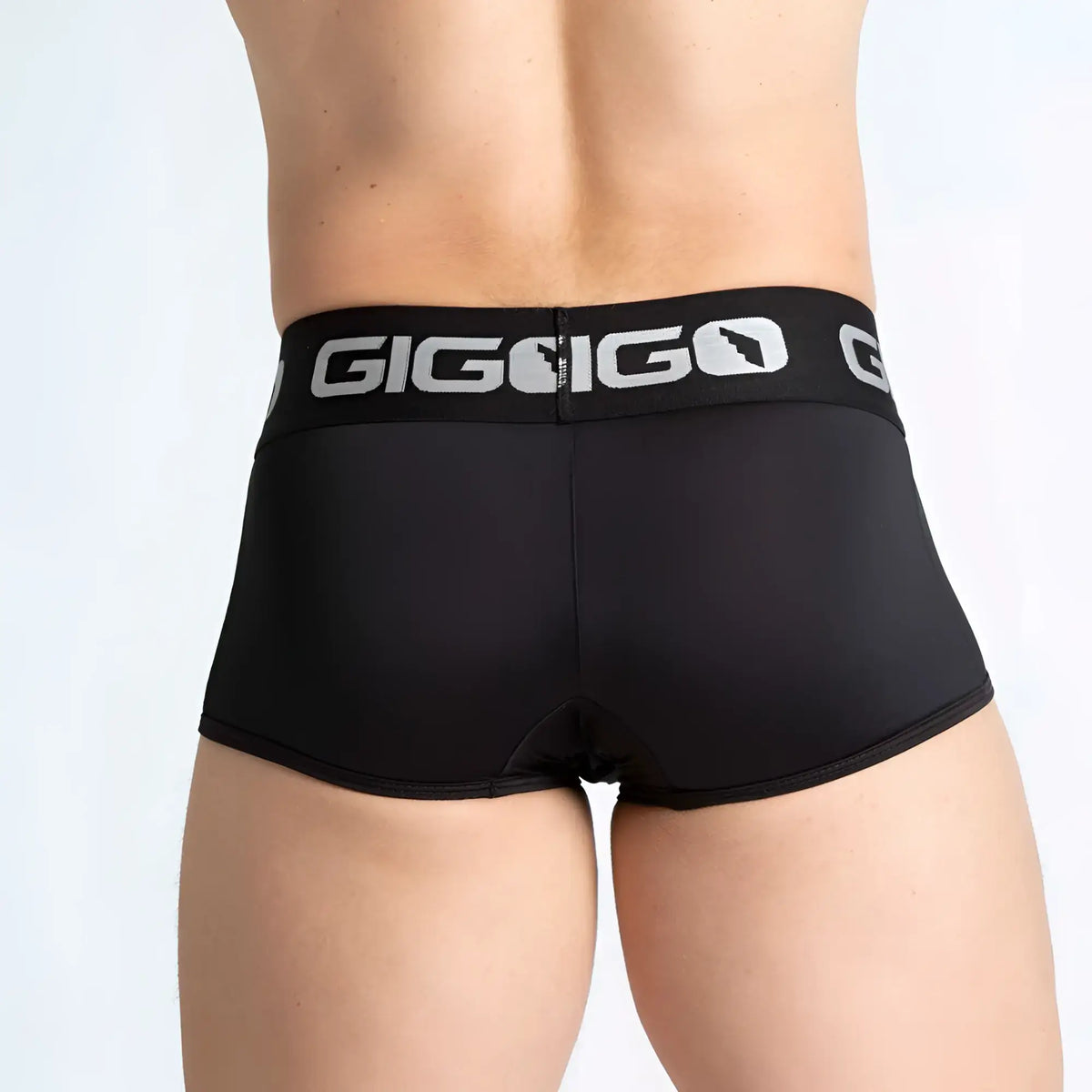 Black gigi go menÃ¢â‚¬â„¢s briefs with silver logo band made from breathable material in the gigo purity black trunk style