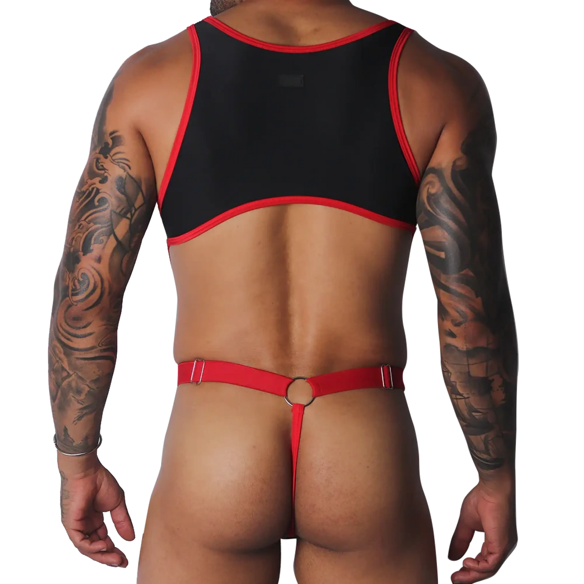 Black and red cropped tank top with thin shoulder straps paired with a red thong strap and metal ring detail.