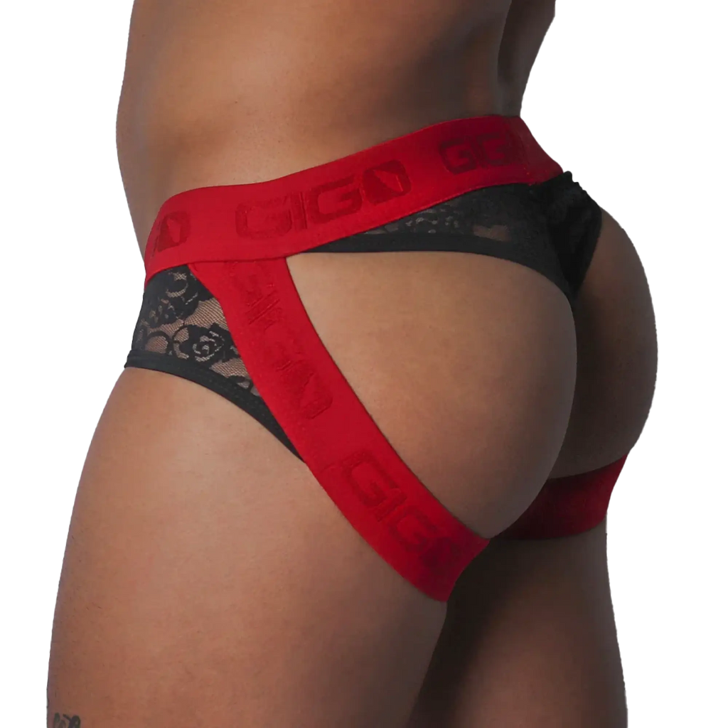 Black floral lace jock thong with bold red elastic straps featuring repeating Gigo logo branding.