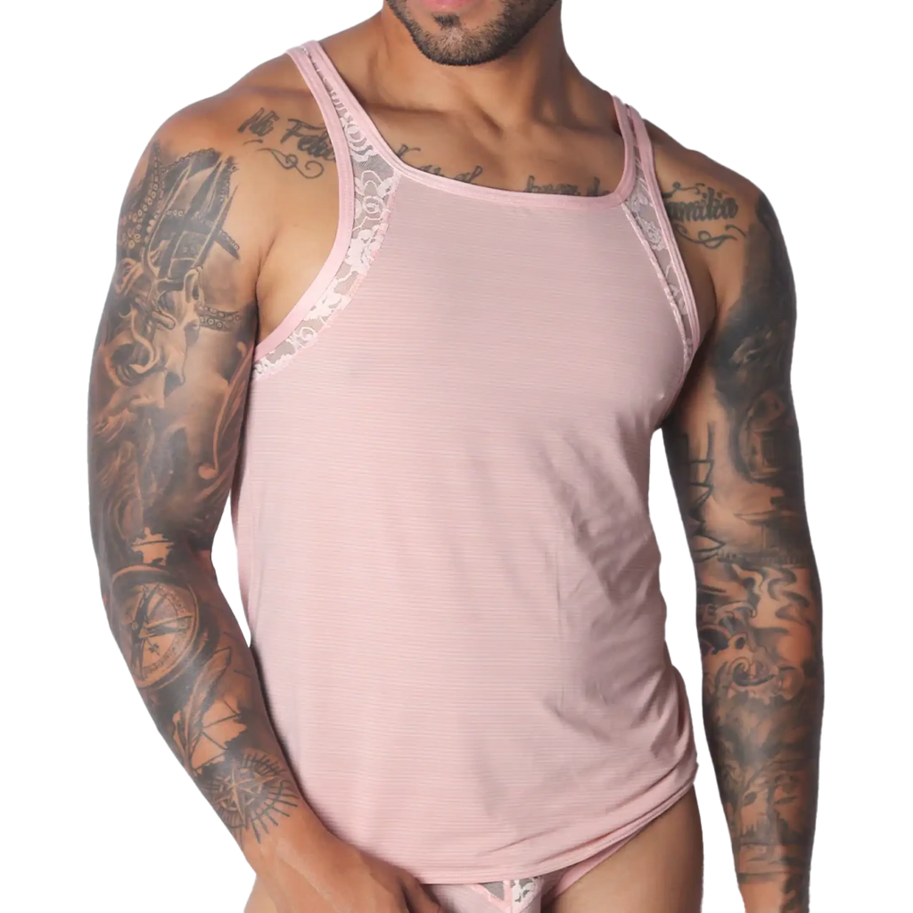Romantic pink ribbed tank top featuring delicate white lace trim along the shoulders and neckline.