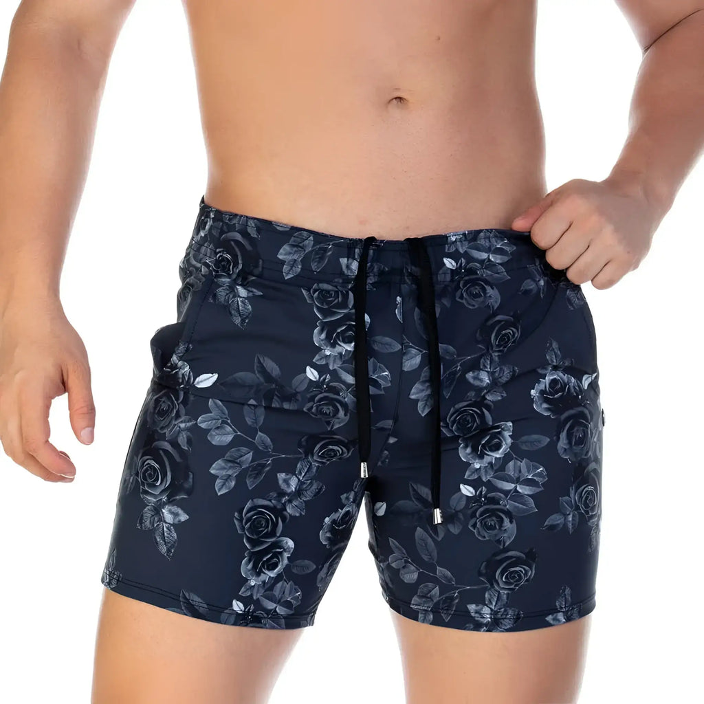Dark blue gigo rose black beachwear swim trunks with subtle black and gray rose floral pattern and matching drawstring