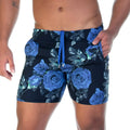 Blue rose patterned swim trunks with navy base teal leaves and matching blue drawstring by Gigo Rose Blue Beachwear