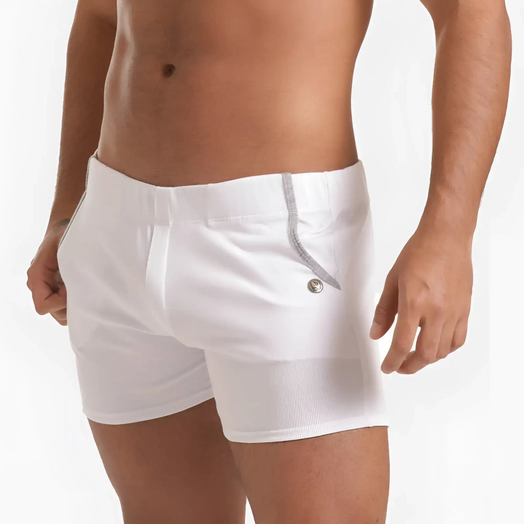 White menÃ¢â‚¬â„¢s swim trunks gigo scanaling with subtle ribbed texture and silver zipper detail